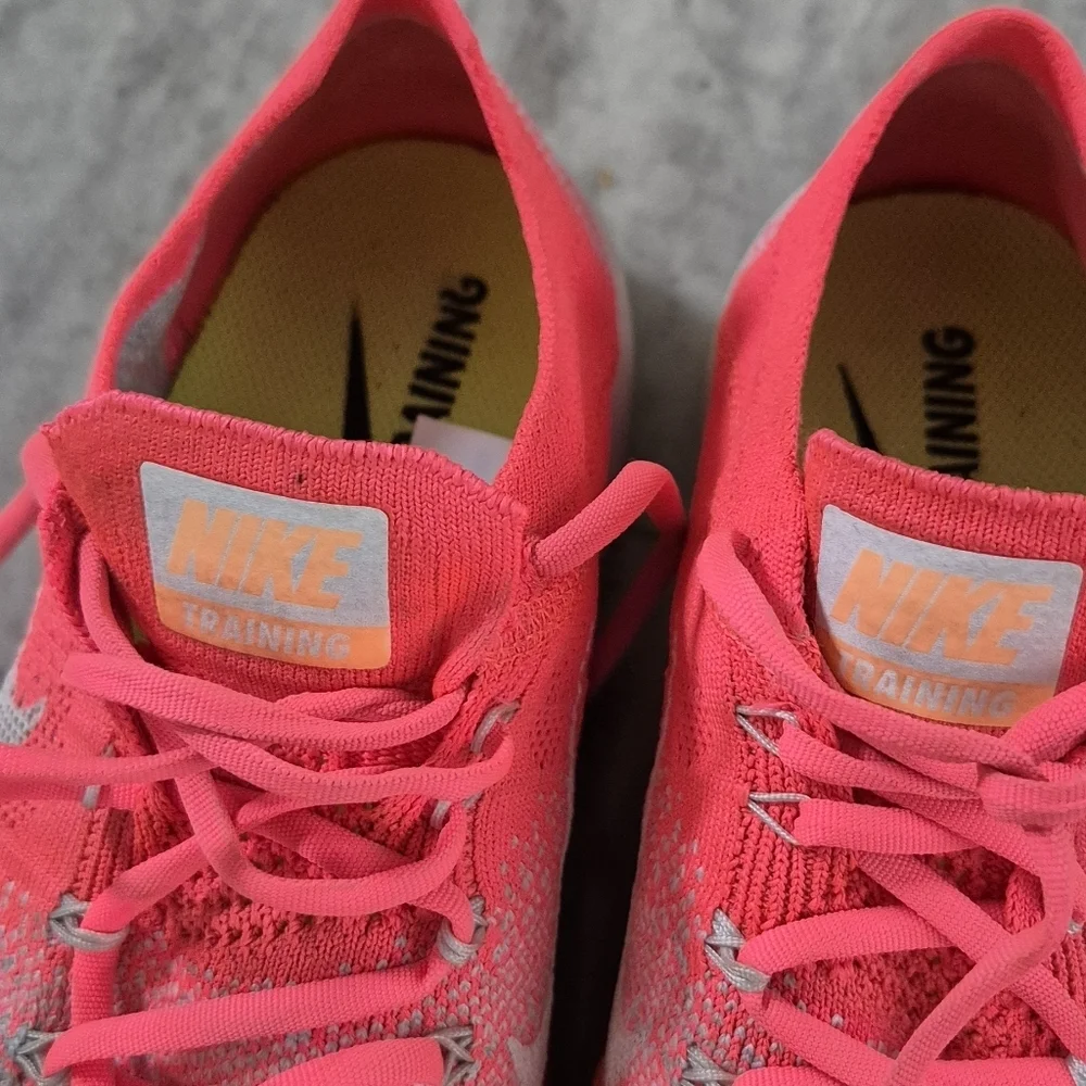 Nike Pink and White Athletic Shoes Modern Sporty Design
